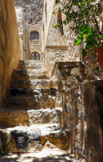 A steep stone lane inside the medieval town of Monemvasia