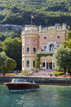 Grand Hotel a Villa Feltrinelli, Gargnano — 1892 villa on Lake Garda's west shore with a Riva boat at the dock