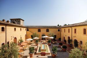 Belmond Castello di Casole — estate exterior