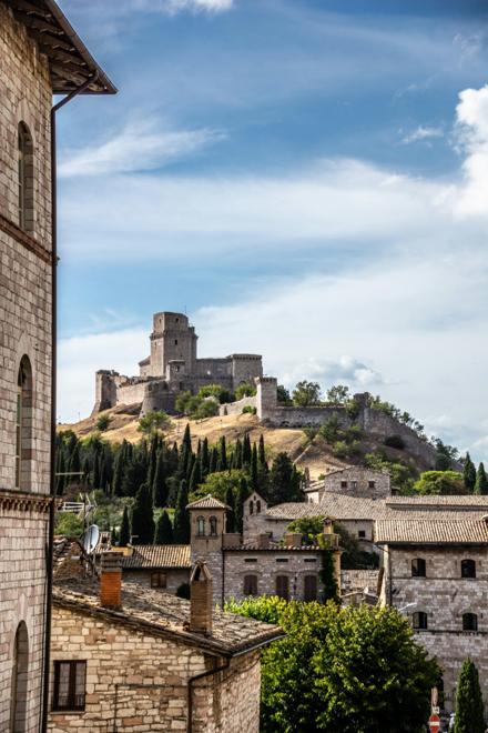 Assisi rooftops climbing to the fortress on the ridge
