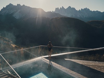Forestis Dolomites — rooftop pool deck above the Plose mountain with Dolomite peaks beyond