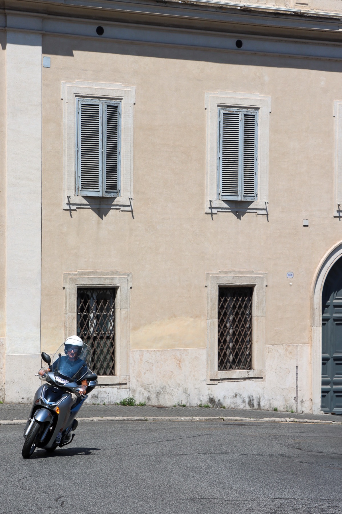 Rome — cyclist in an evening piazza