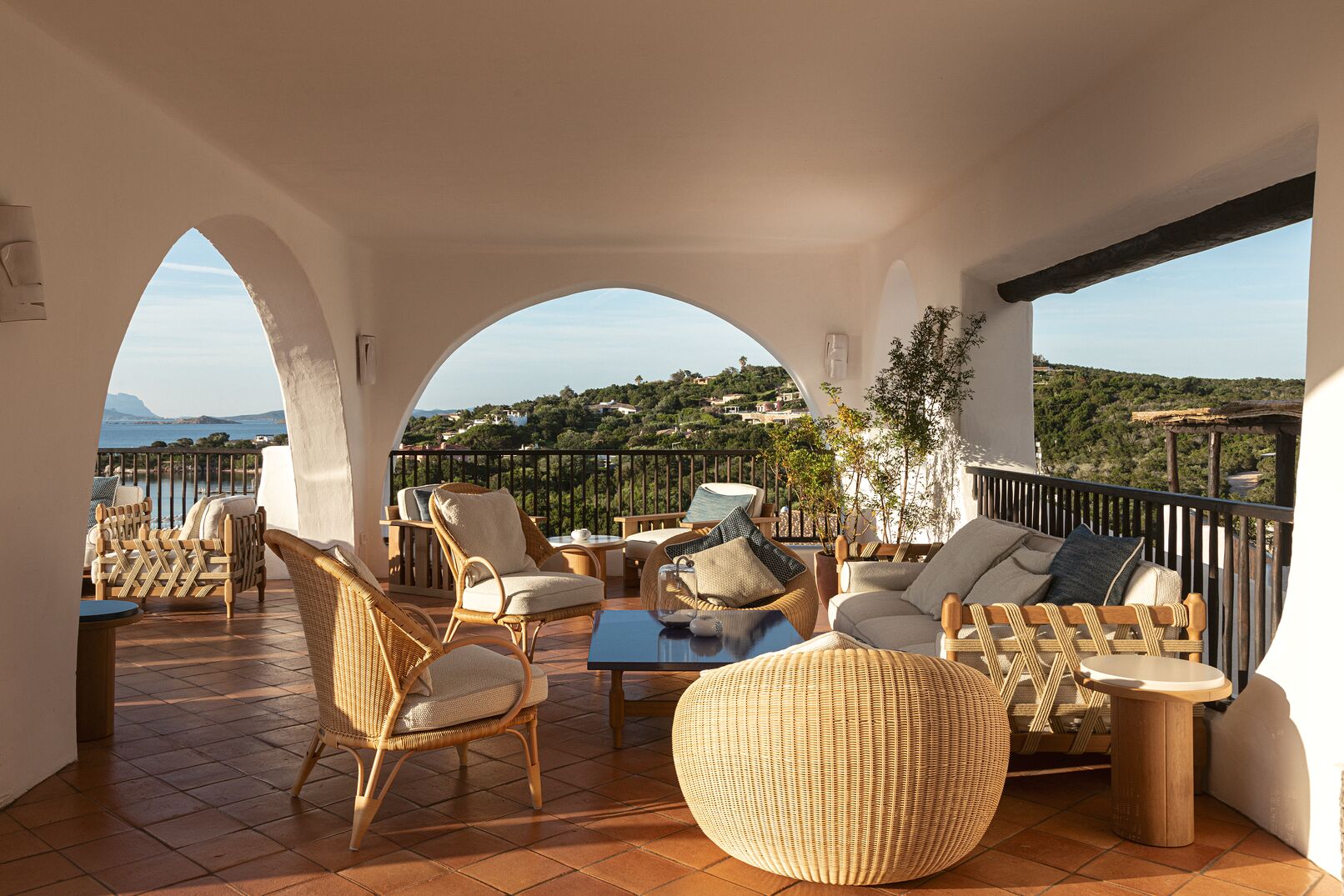 Romazzino, A Belmond Hotel — loggia with white sculpted arches opening to the Costa Smeralda sea